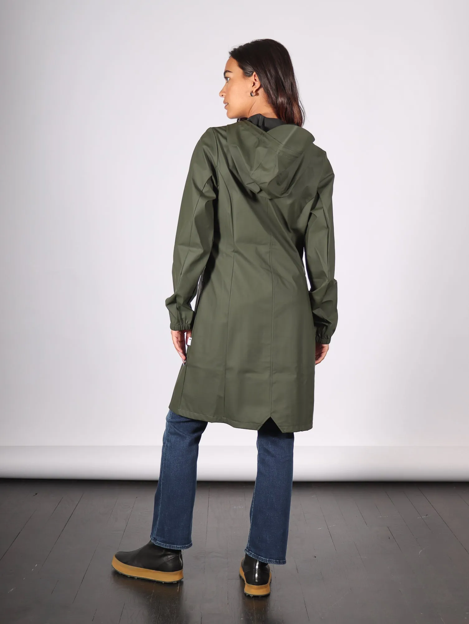 Cargo Curve W Jacket in Green by RAINS