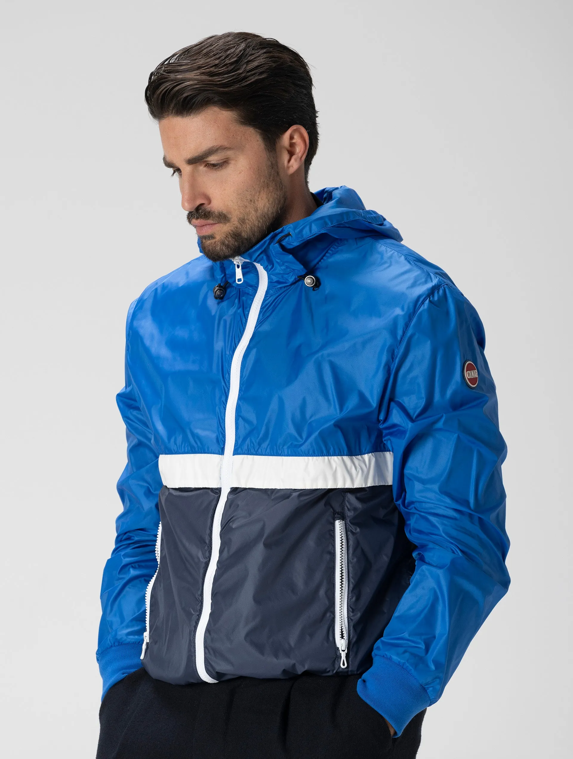 CONCRETE WATERPROOF JACKET IN BLUE COLOR BLOCK